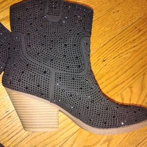 Black Heeled Boots with Perforated Design